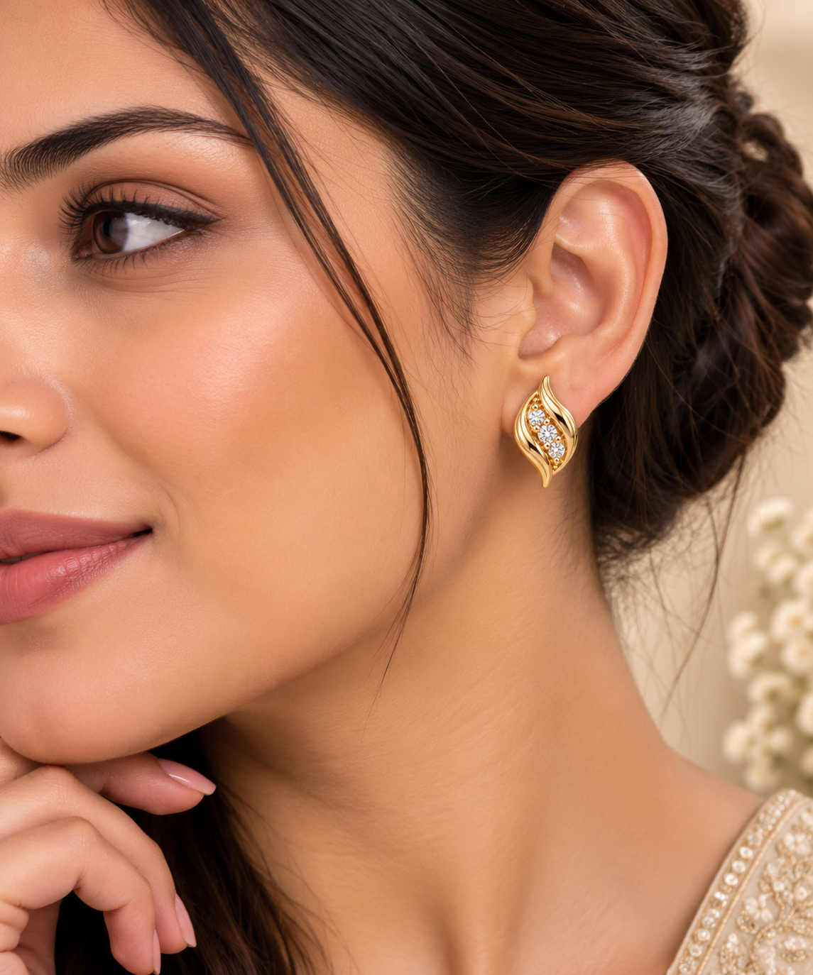 Gold-Toned Twisted Leaf Stud Earrings