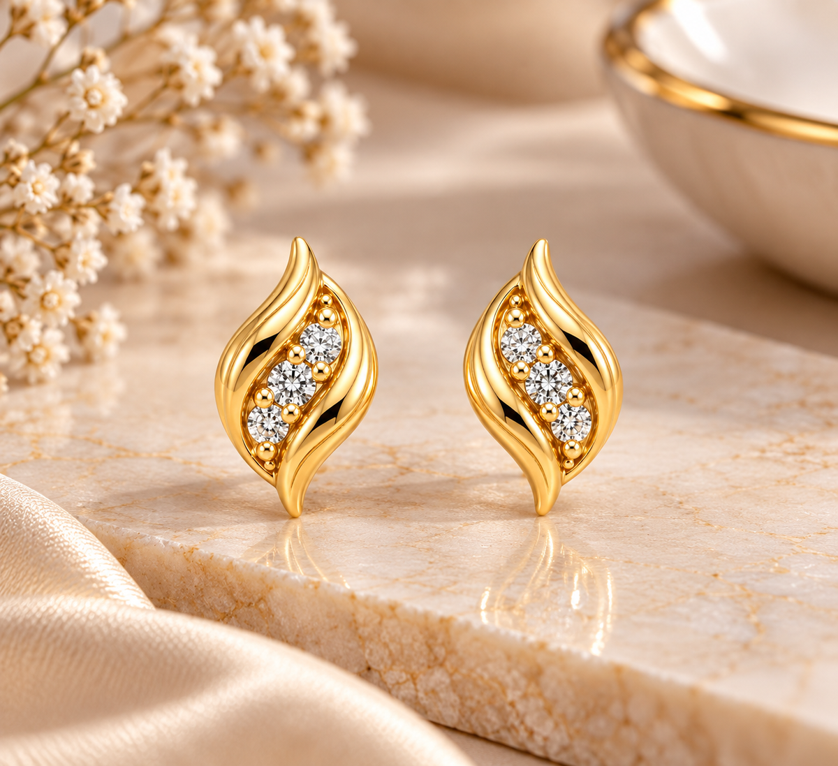 Gold-Toned Twisted Leaf Stud Earrings