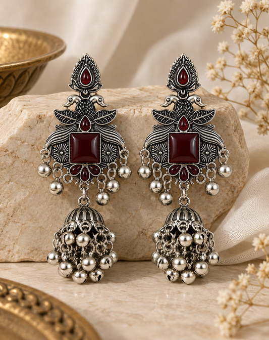 Premium Oxidized Silver-Toned Peacock Design Red Stone Jhumka Earrings
