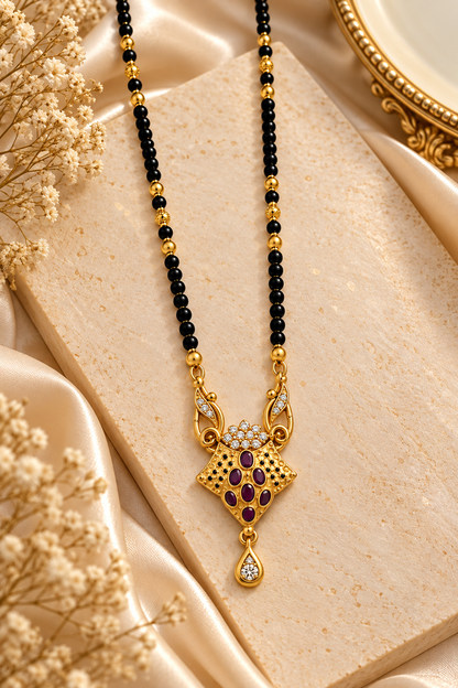 Gold-Toned Black Beaded Mangalsutra with Floral Pendant