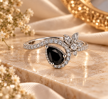 Elegant Silver-Toned Statement Ring with Black Teardrop Stone